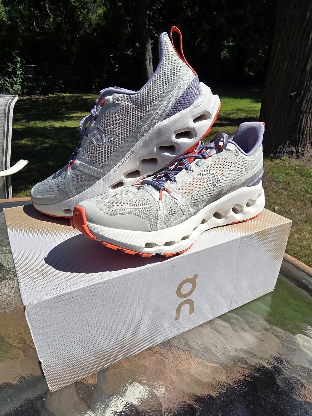 *On Running White and Orange Cloud Shoes with Gray Accents. NEW